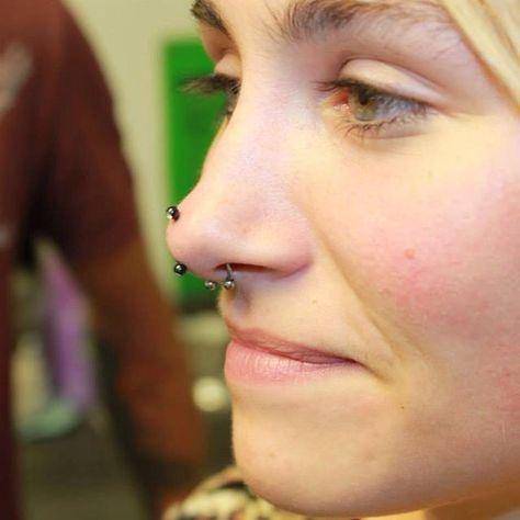 saddle nose from septum piercing